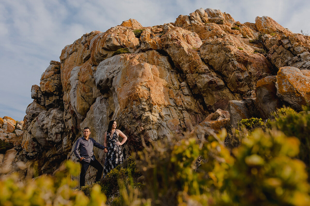 Creative couple engagement shoot with big boulders