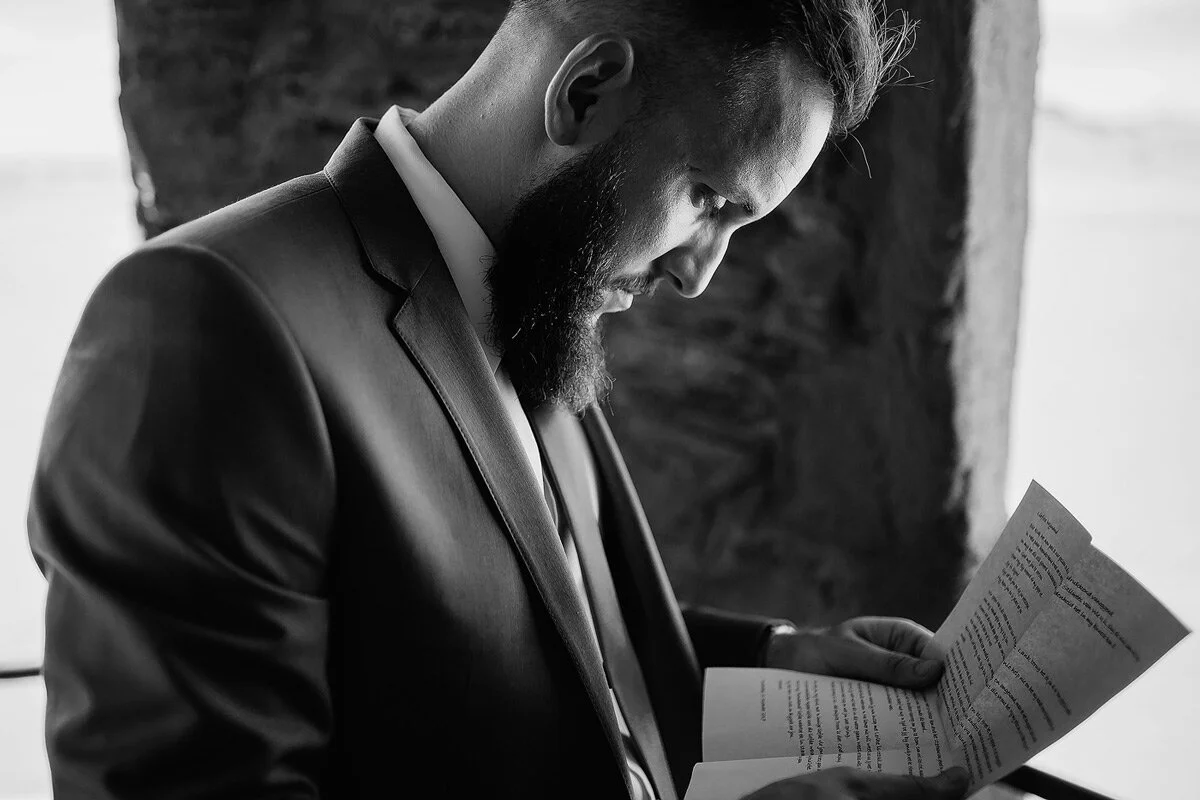 Groom reads emotional letter from bride on his wedding day.