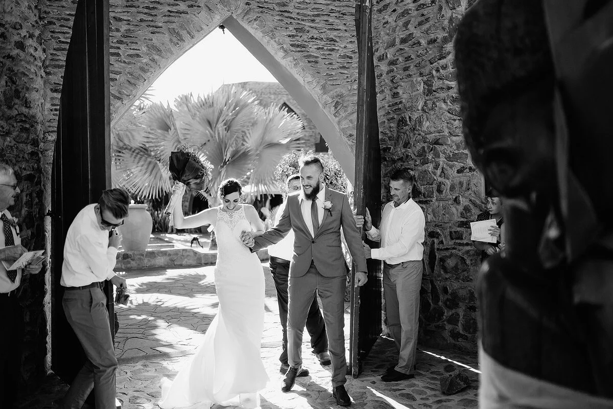 Wedding exit with confetti after ceremony at Le Mirage Resort in Namibia.