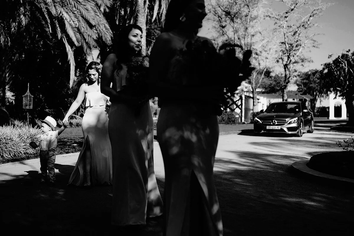 Kids at wedding entering the ceremony with bridesmaids