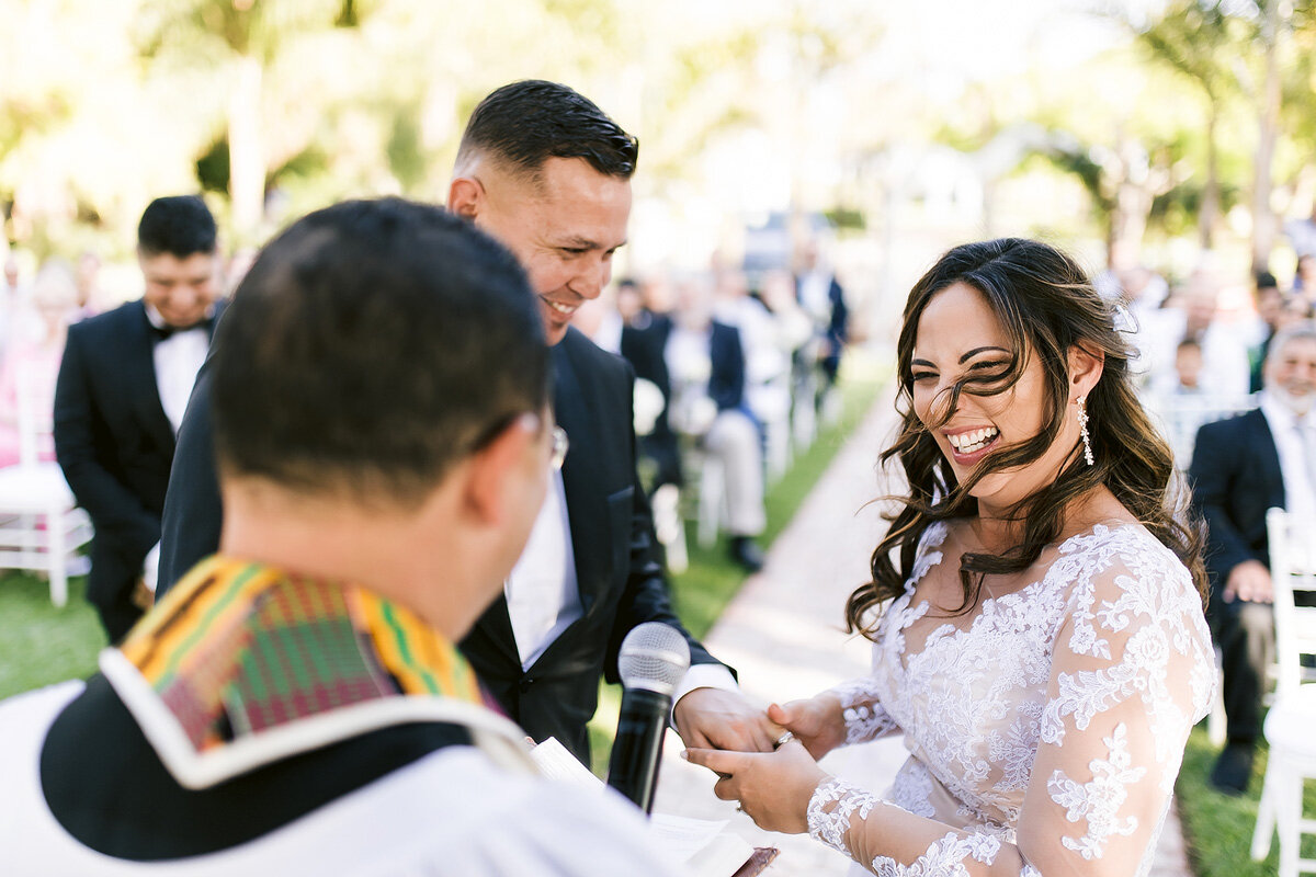 Laughing Bride moment during wedding ring exchange in Upington.