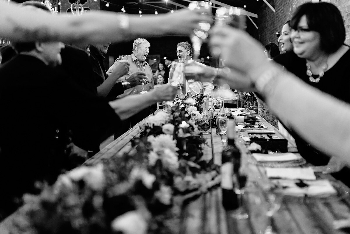 Guest toast with champagne after the wedding speeches in Upington South Africa.