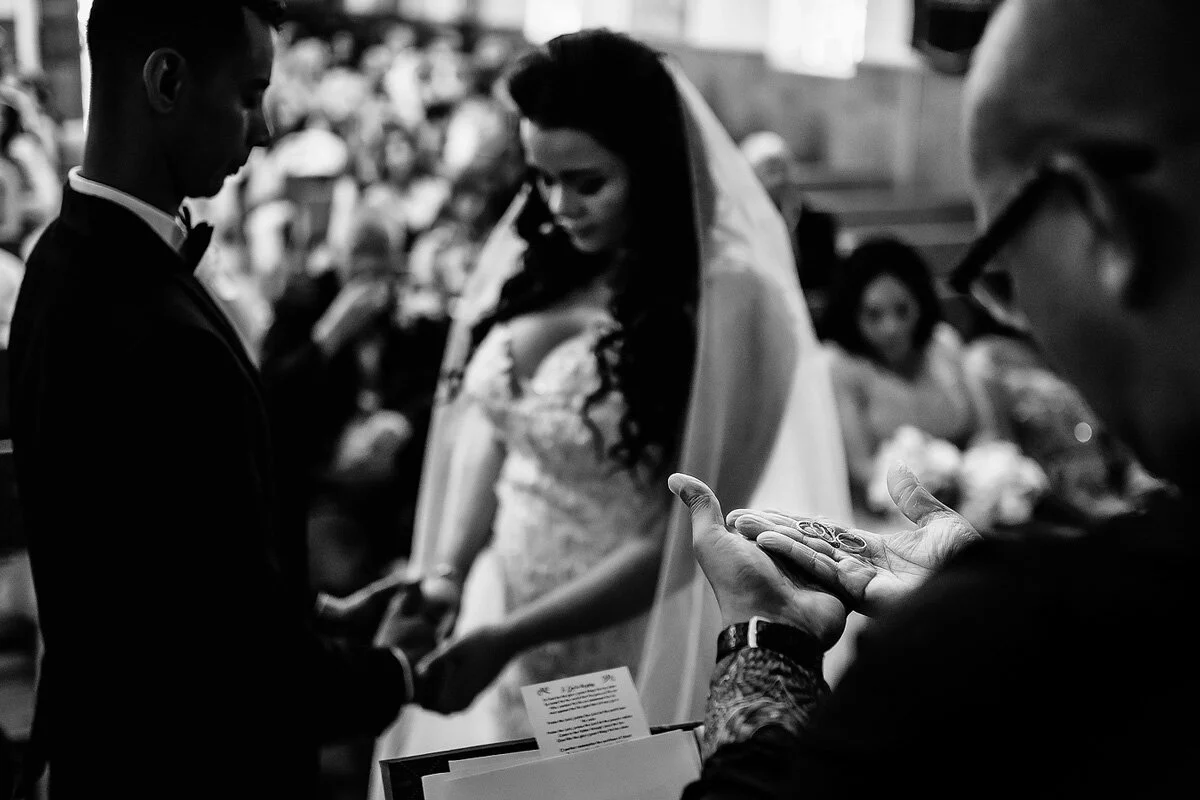 The Pastor giving his blessing on the wedding rings during a Northern Cape Wedding.