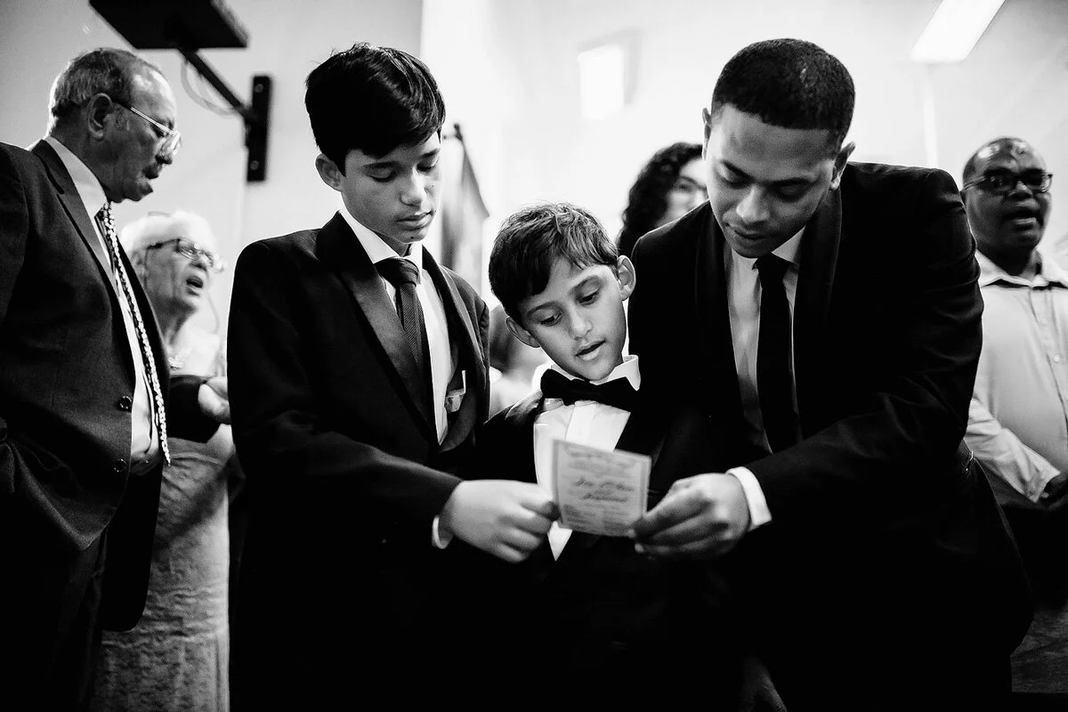 Guests singing Hymns at a Church during a wedding in the Northern Cape of South Africa.