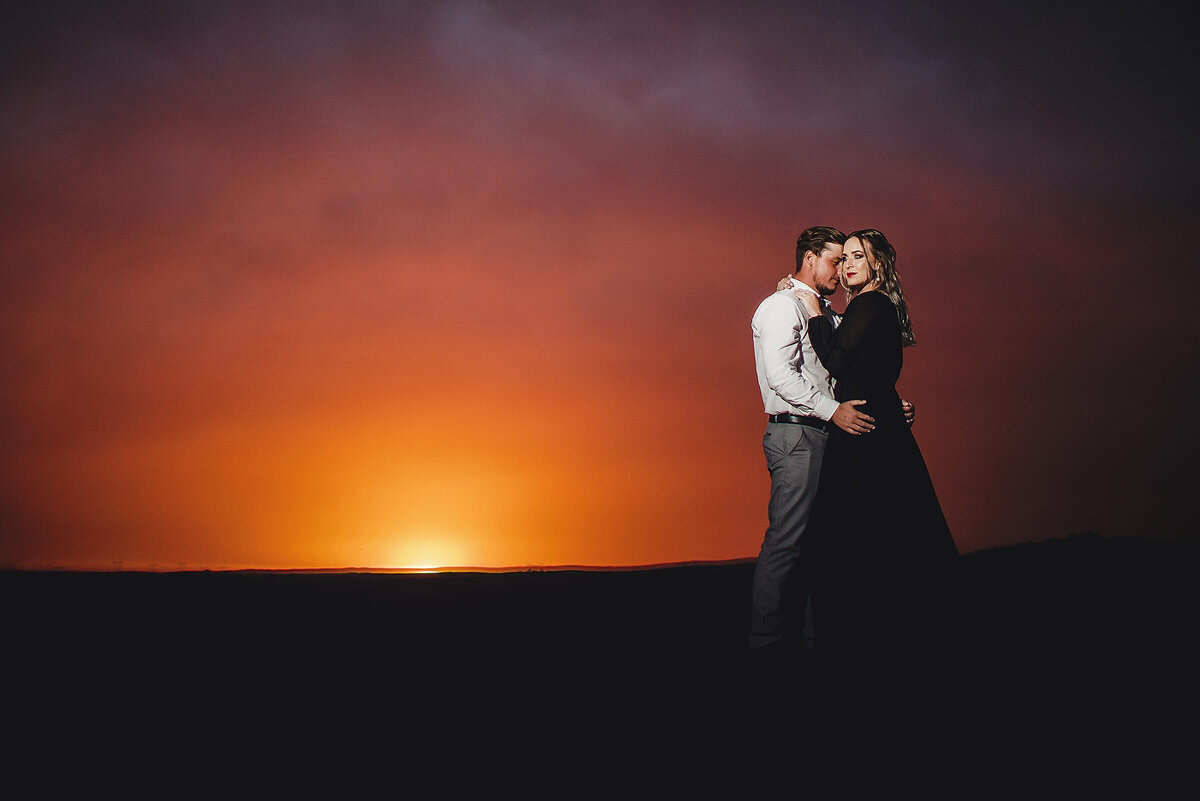 Golden Hour Engagement Sunset Photo with dramatic sky in the Garden Route.