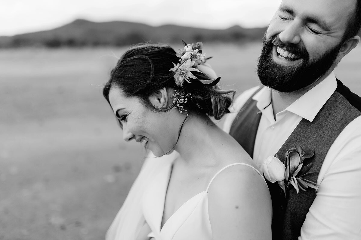 Fun wedding couple photo shoot with laughter and smiles during an African Destination Wedding.