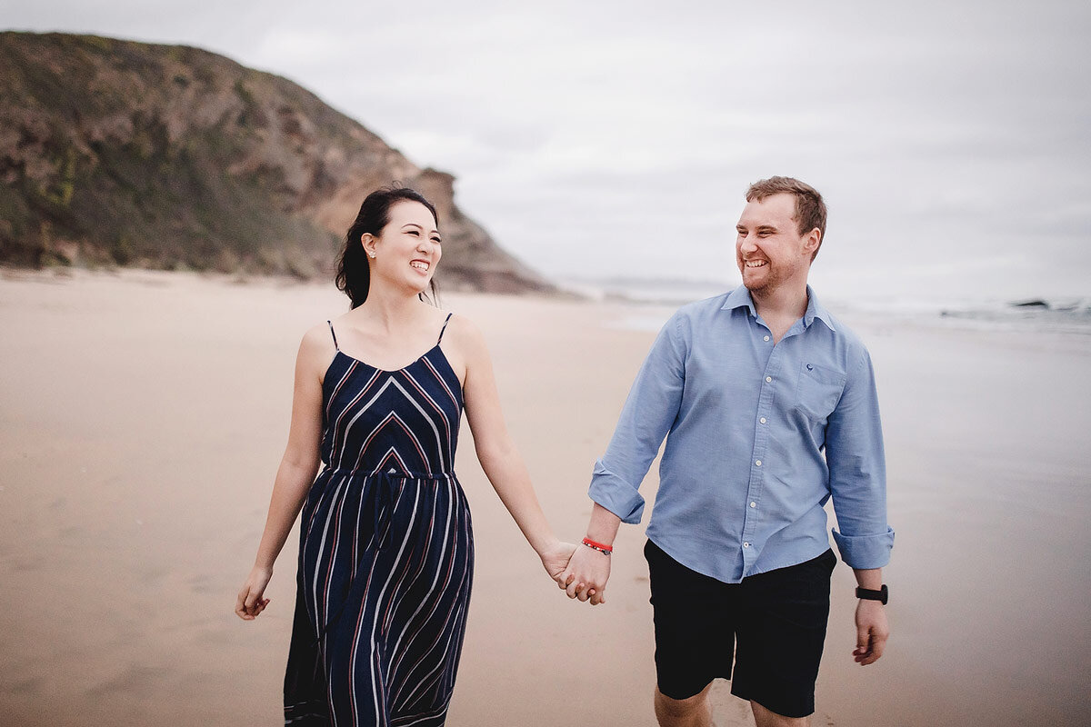 Fun Moments Couple Portraits on a beach in the Garden Route.