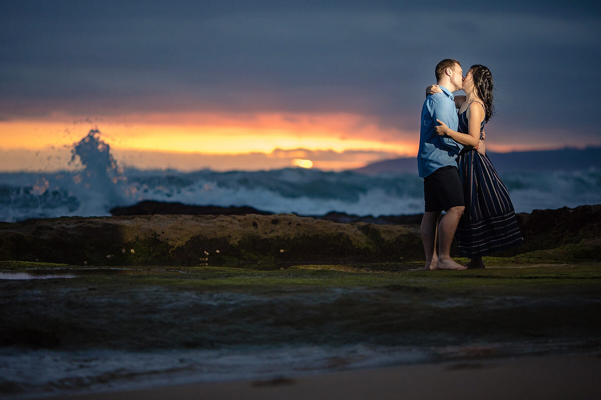 Sunset Portraits on the beach with couple in the early evening during summer in the Garden Route.
