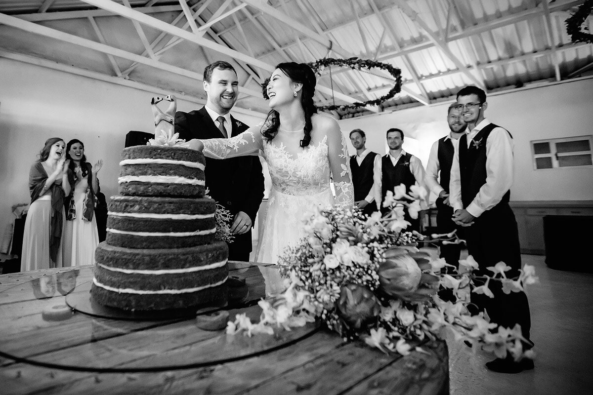 Three tier wedding cake cut by the Bride and Groom on their wedding day.