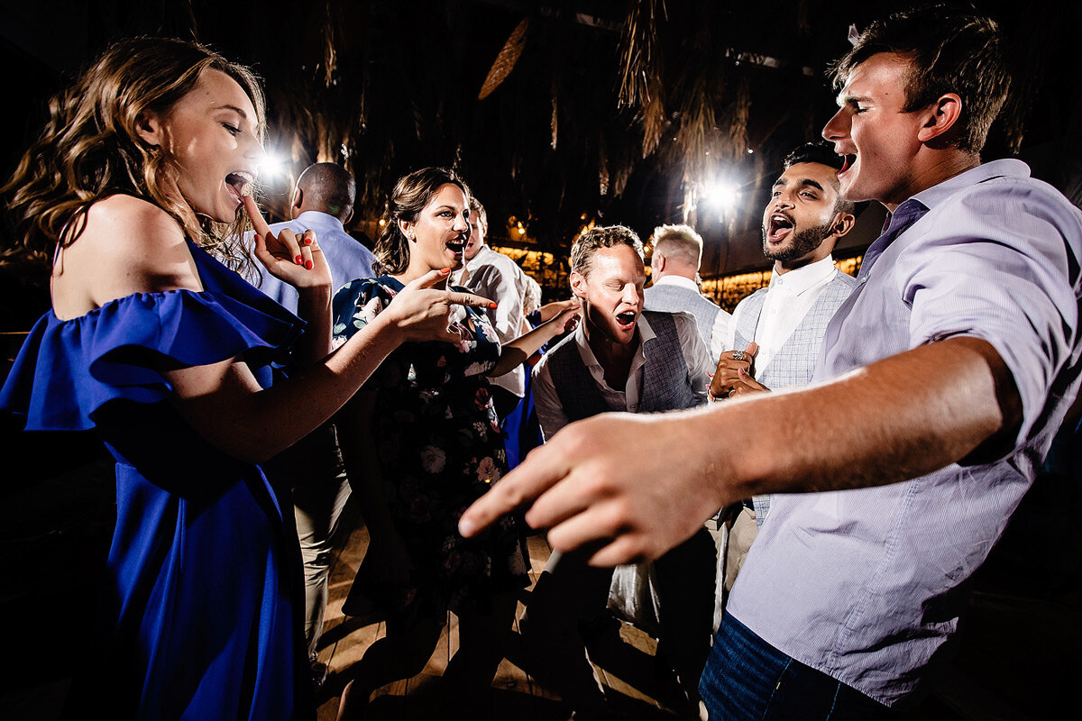 Fun, high energy wedding dancing with the guests on the dance floor at a Garden Route Destination Wedding.