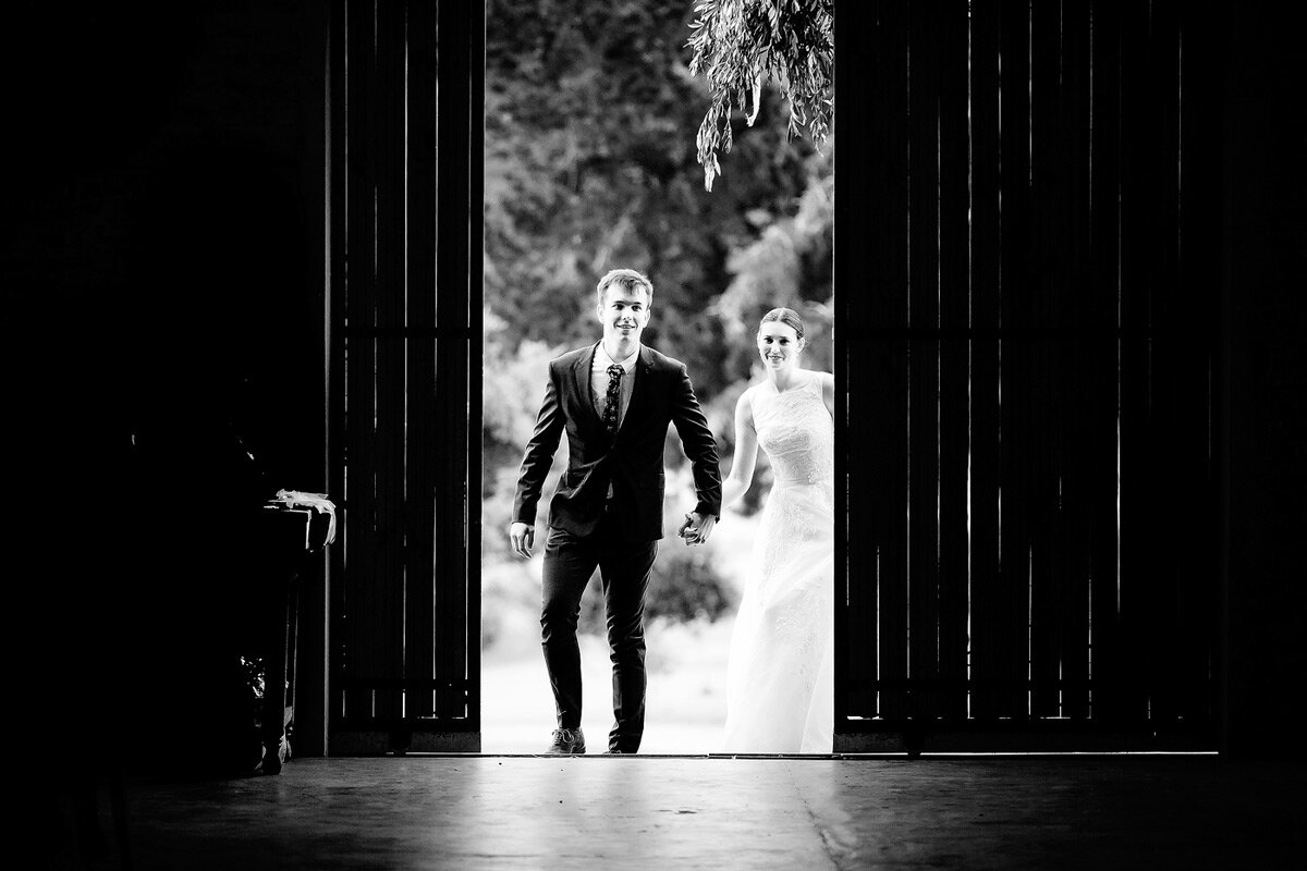 Bride and Groom entering the wedding reception area.