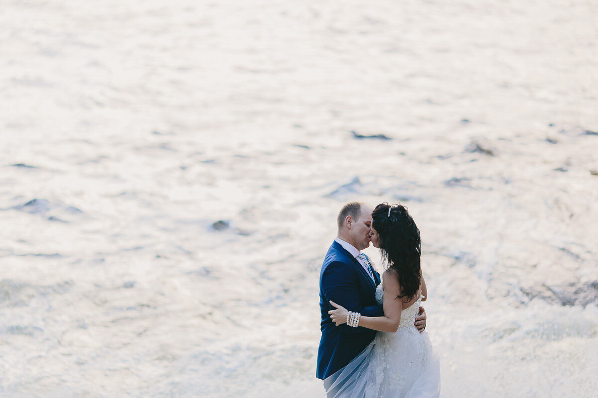 Couple Elopement Portraits on a beach in Stormsriver.