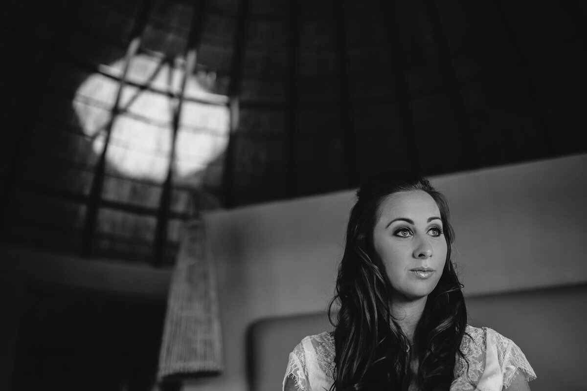 Bridal Elopement portraits in a traditional African hut.