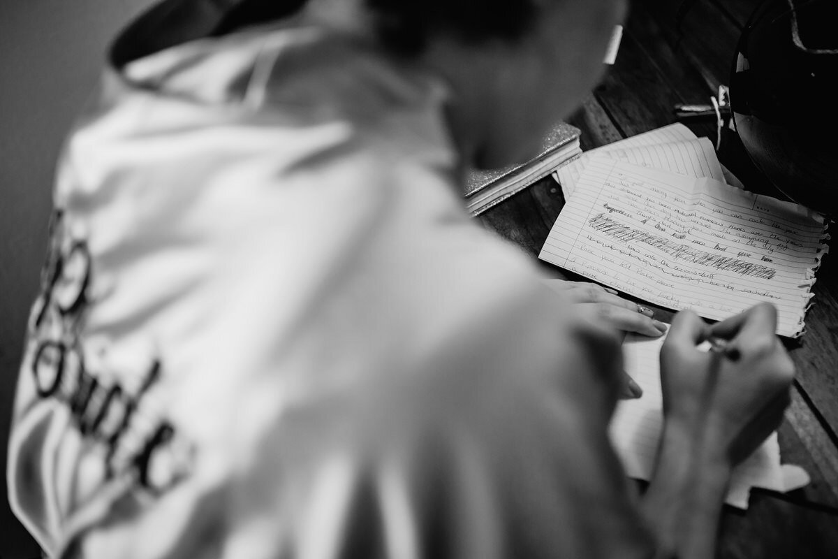 Bride writing her wedding vows before her wedding in the Overberg of South Africa.