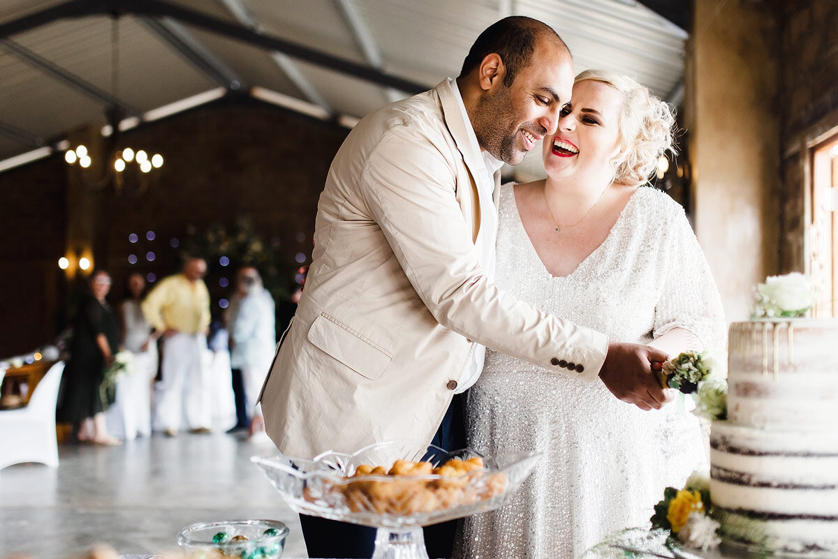 Cutting of South African Made Halaal Wedding Cake.