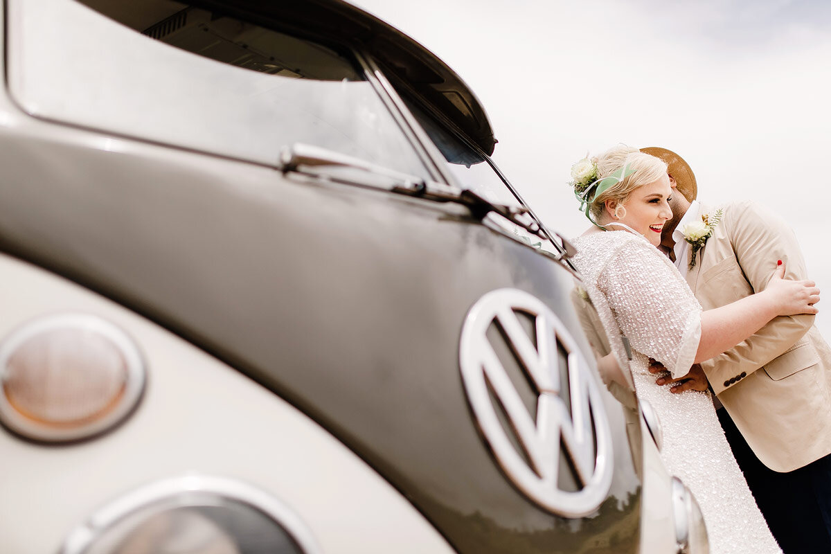 Fun Wedding Couple Portrait with a VW Kombi bus in the Garden Route.