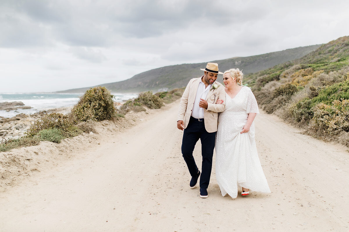 Bride and Groom intimate wedding elopement beach portraits in Stilbaai South Africa.