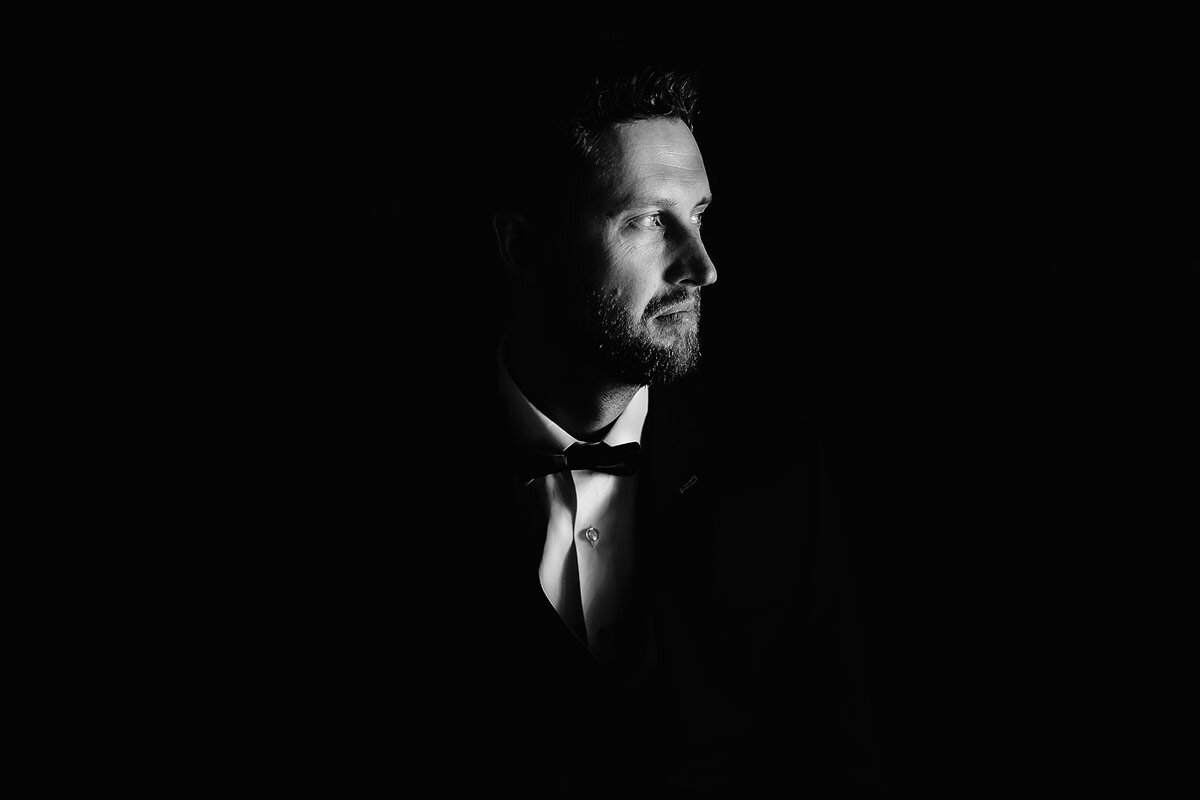 Creative Groom Portrait in black and white.