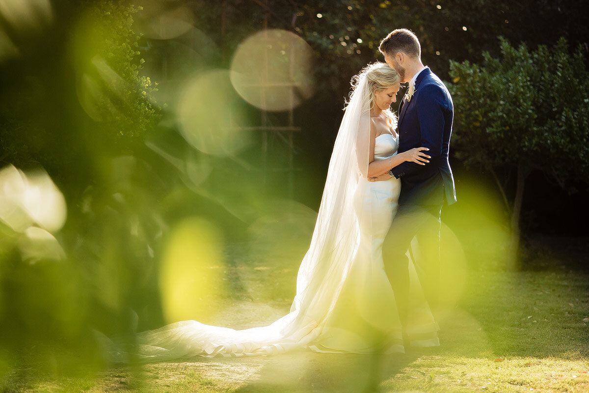 Elegant and stylish wedding portraits in a Garden.