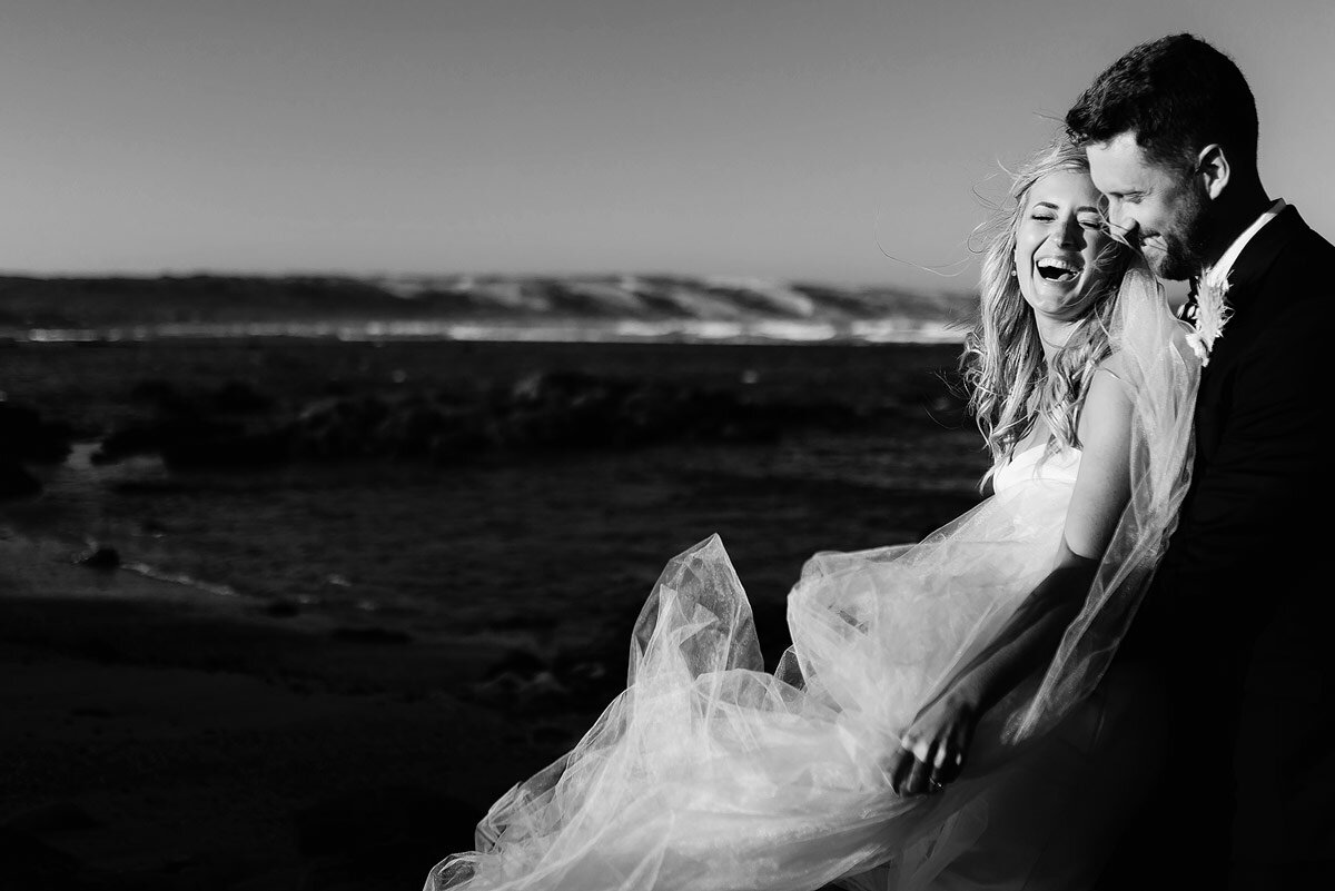 Elegant and stylish wedding couple portraits on the beach near mossel bay in South Africa.