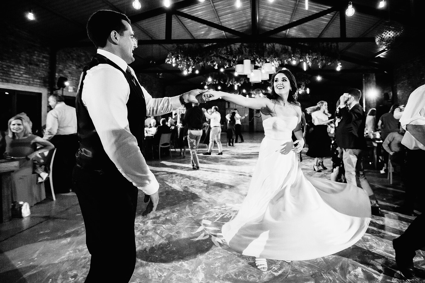Bride and groom dancing on their wedding day.