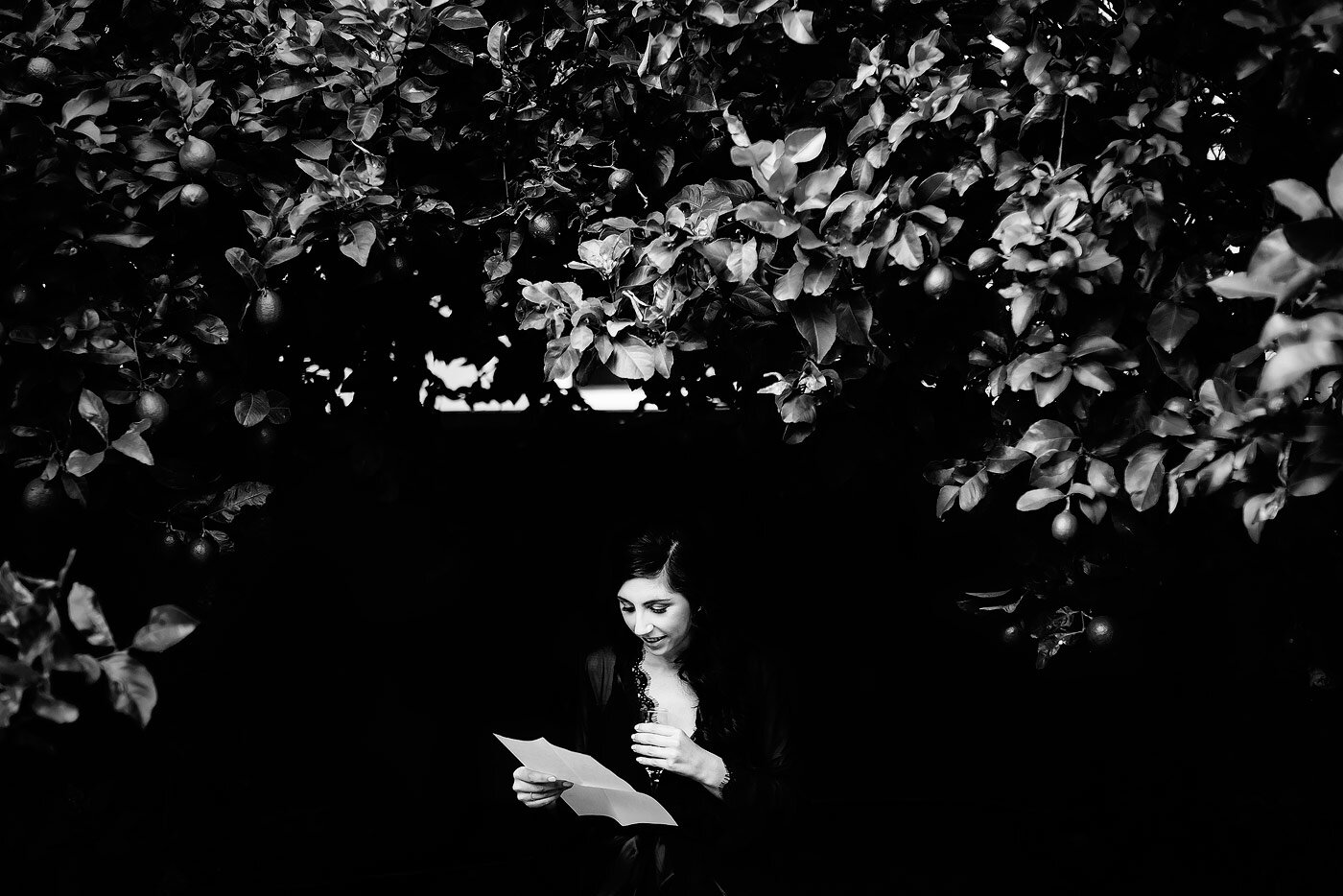 Bride reading a letter from her Groom.