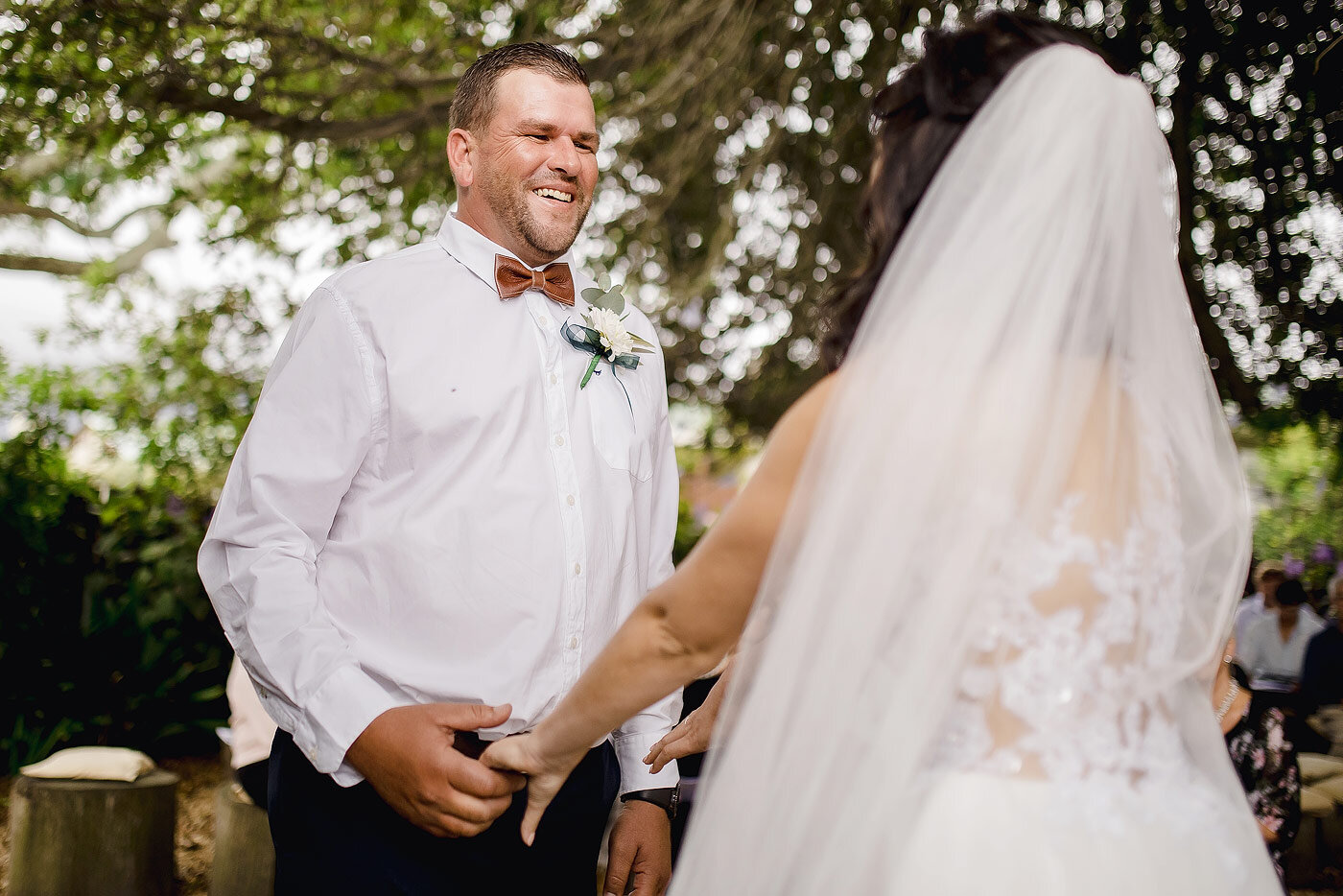 Bride meeting her groom at the altar.