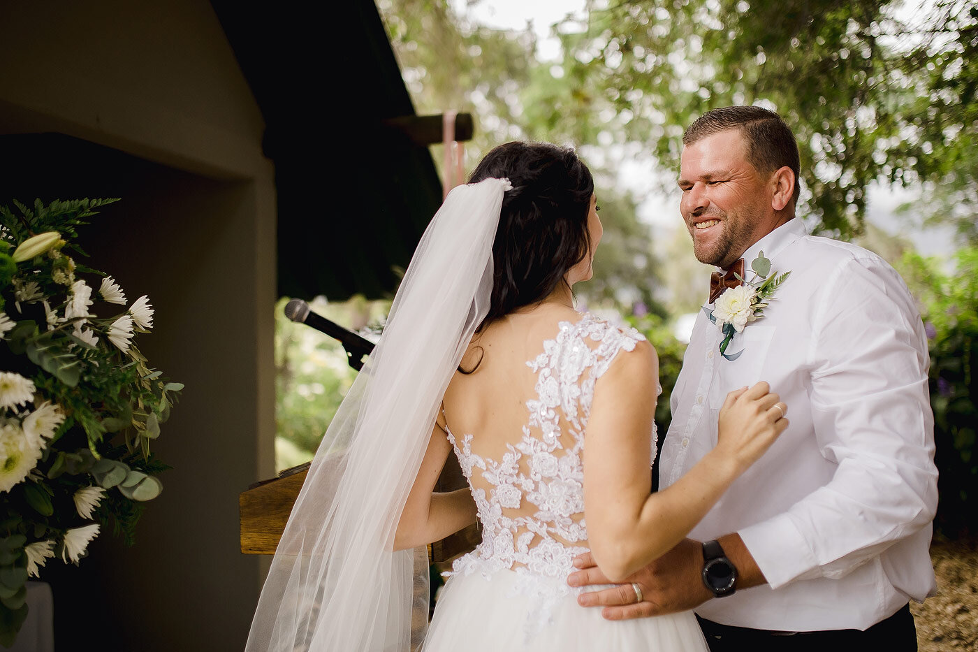 Bride and groom laughing after the wedding  ceremony in  George.