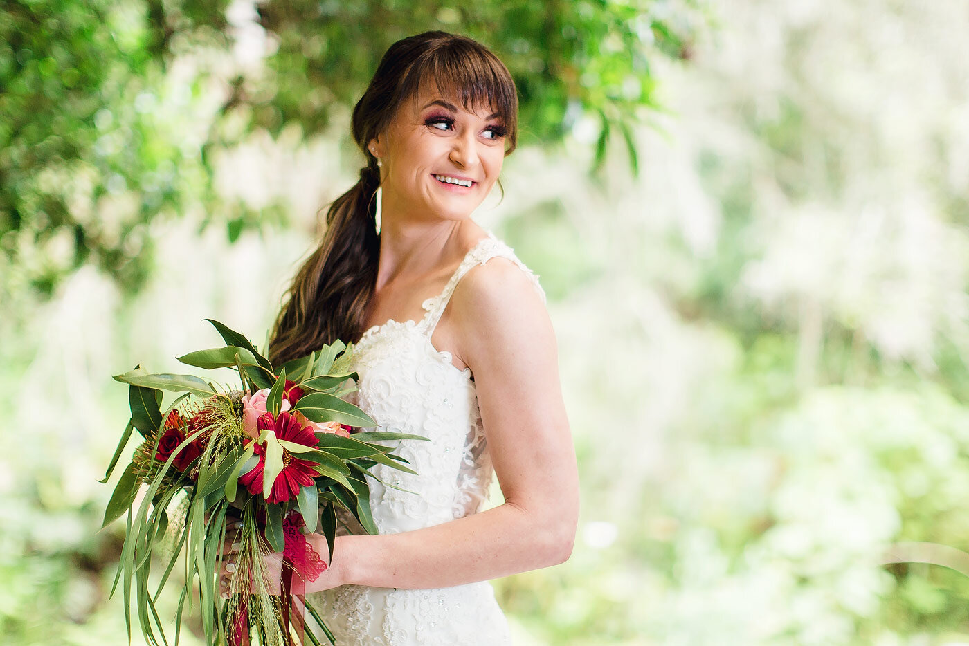 Elegant and vibrant Bridal Wedding portraits at a forest wedding venue.