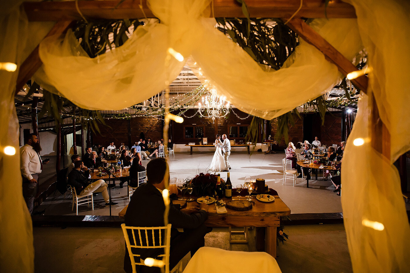 Bride and father dancing at the wedding reception near Hoekwil.