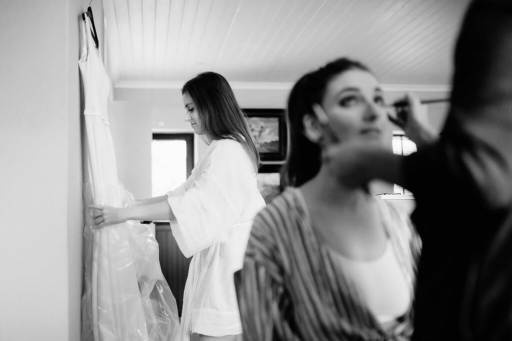 Bride looking at Wedding Dress