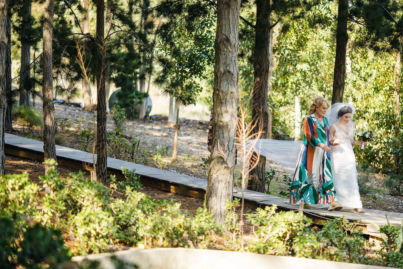 Bride and her mother arriving at the wedding ceremony