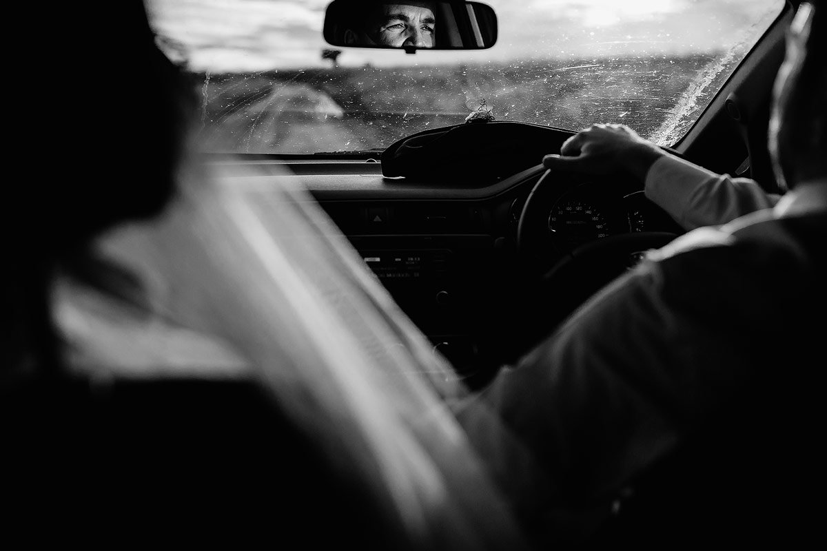 Bride and Groom driving to the portrait shoot locations.