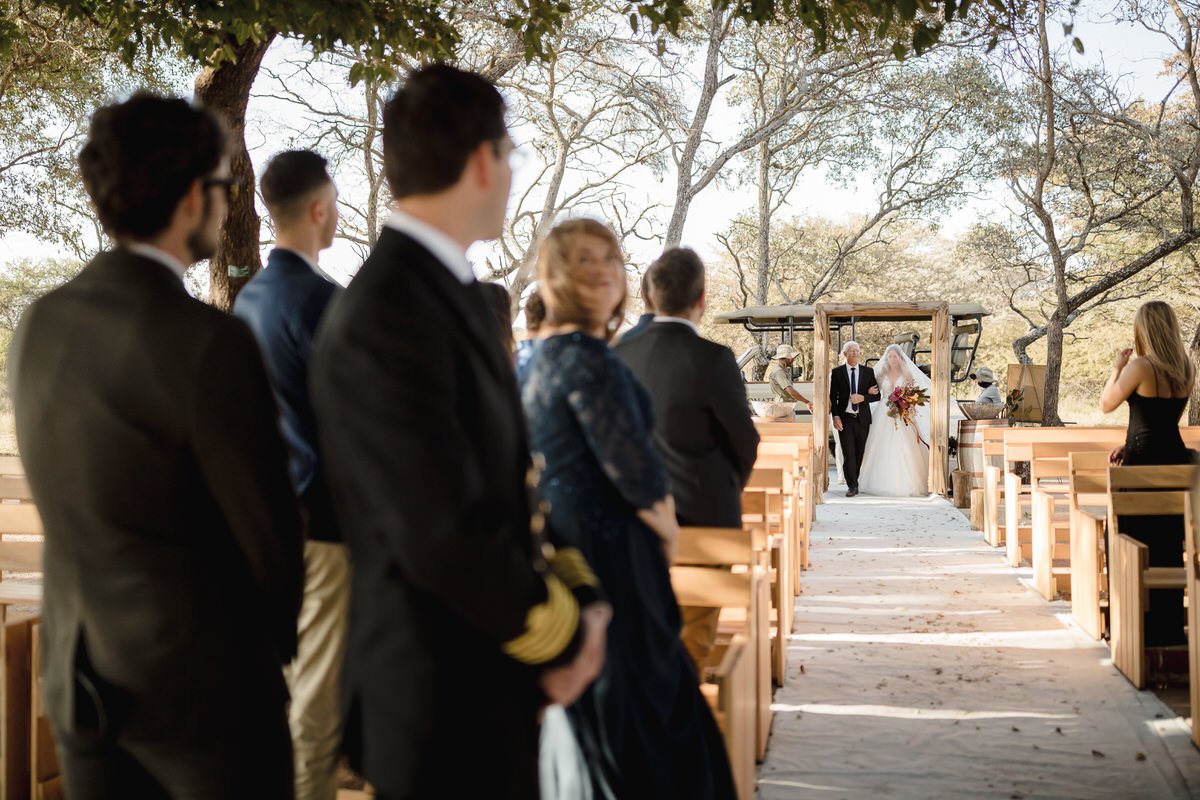 Bride entrance at the outdoor wedding ceremony.