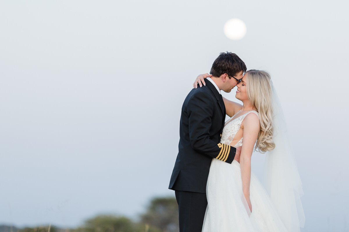 Wedding couple portraits with a full moon in Limpopo.