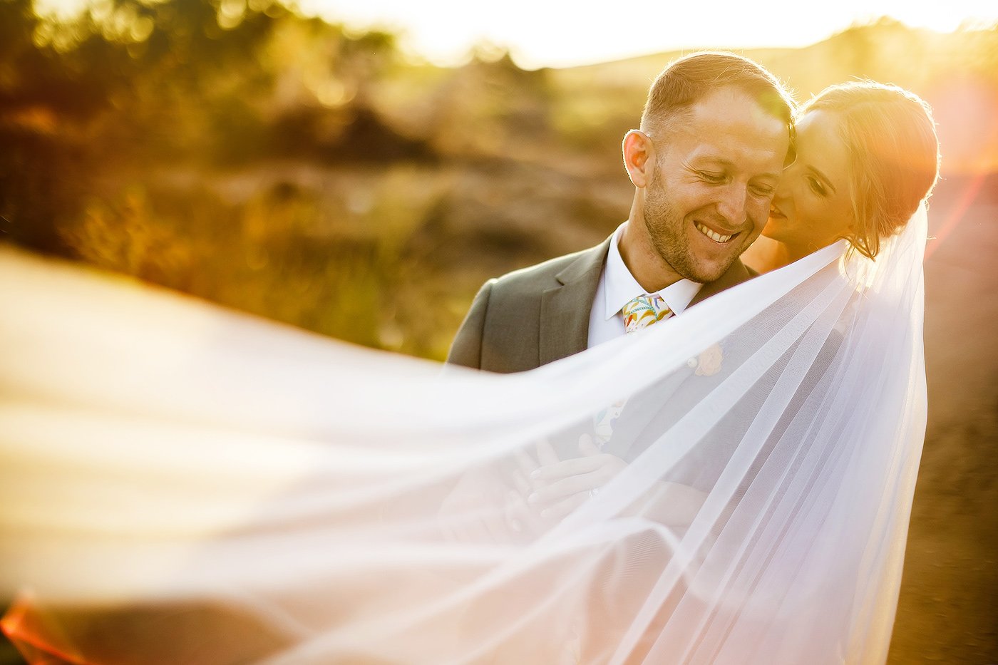 Golden Hour Couple Wedding photo with veil
