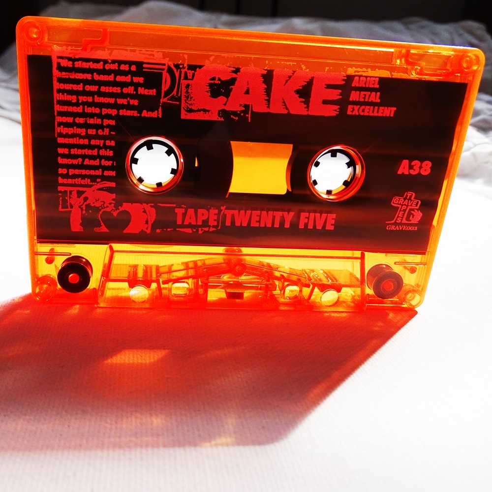 CAKE (UK) - Tape Twenty Five - Limited Edition Transluscent Orange Cassette