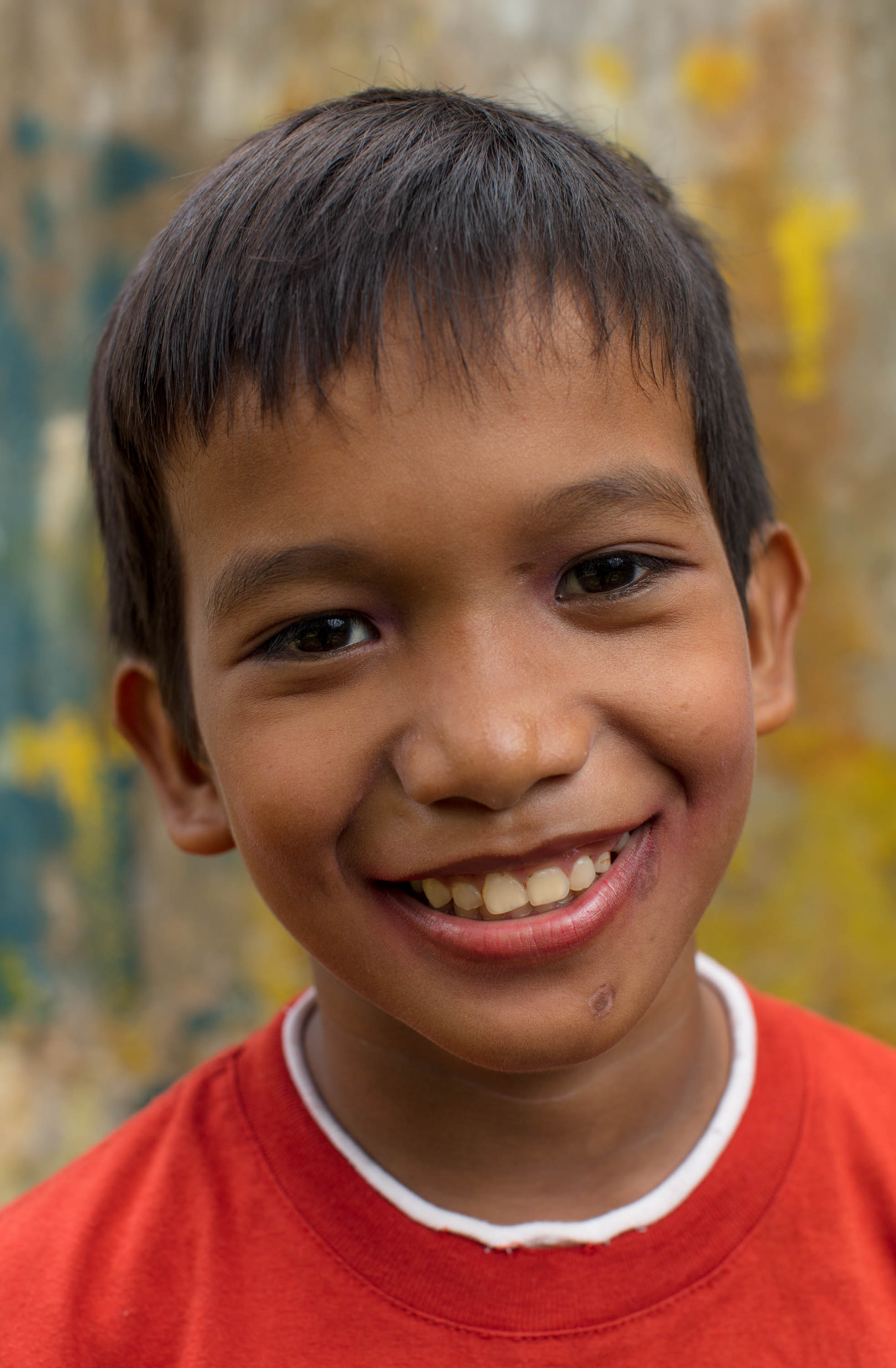 My name is Miguel and I’m 12 years old. My Mother is a housewife and my Father is a bus driver. My parents are always fighting because my Father is an alcoholic. Sometimes he comes home with no money from work because he spent it all drinking. Then we have no food to eat and we usually eat plain rice with soy sauce or plain rice with salt. I’m malnourished due to lack of foods and I don’t grow. My Father is very irresponsible. Our house is very poor and has alot of holes in the roof, so when it rains we get wet. I’m happiest when I’m celebrating my birthday, because then we eat delicious foods. 