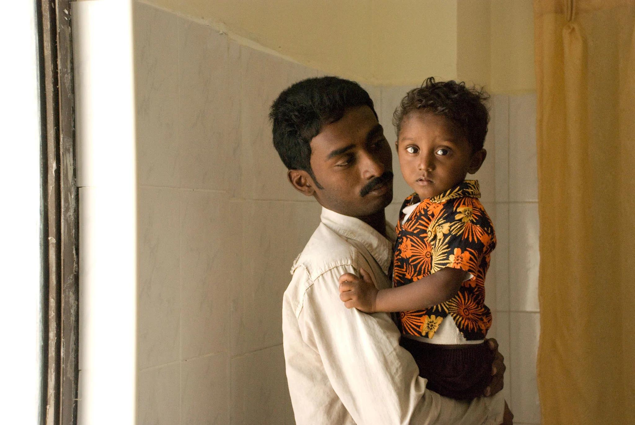 dad and son by window_1.jpg