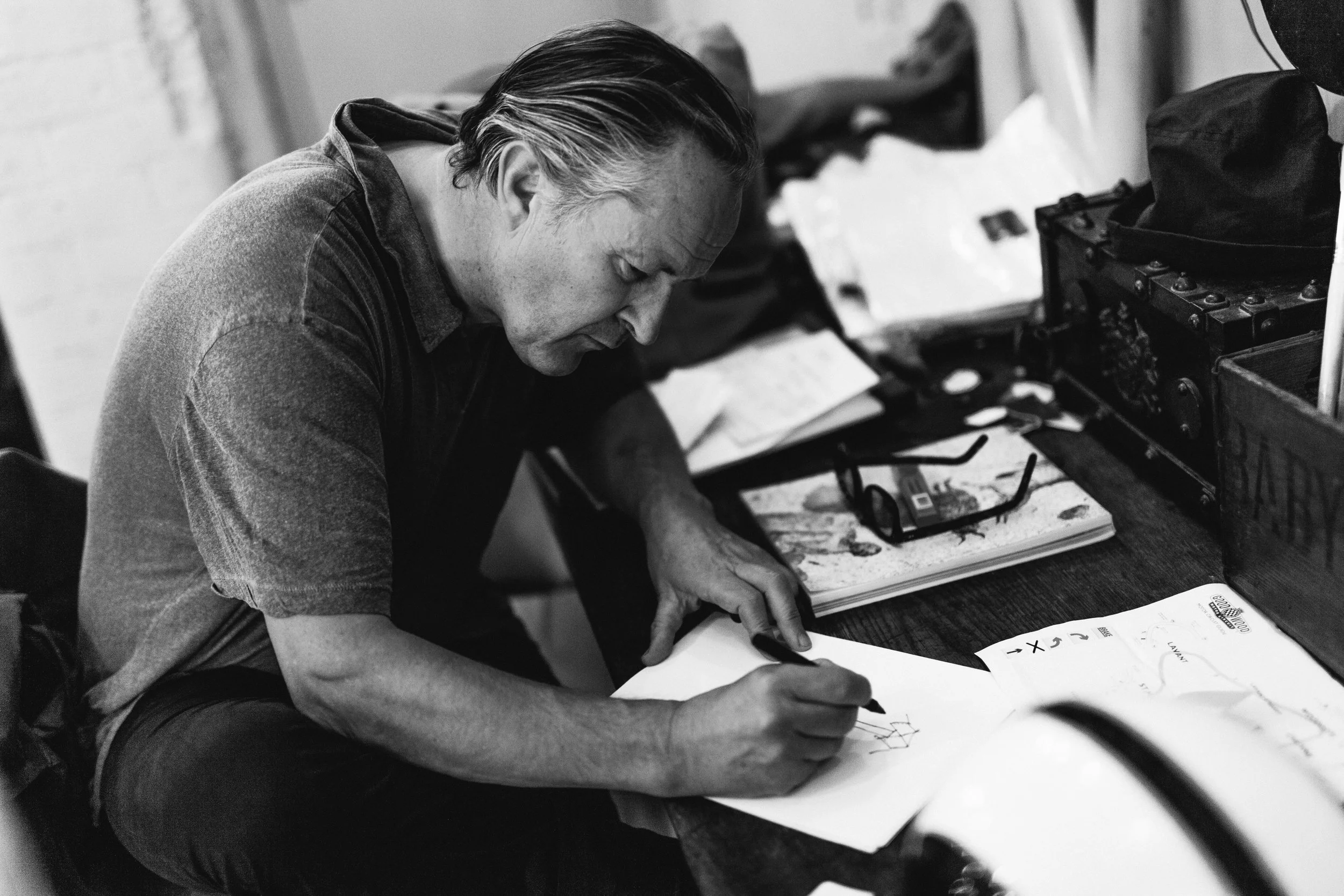 Nick Ashley drawing fashion sketches