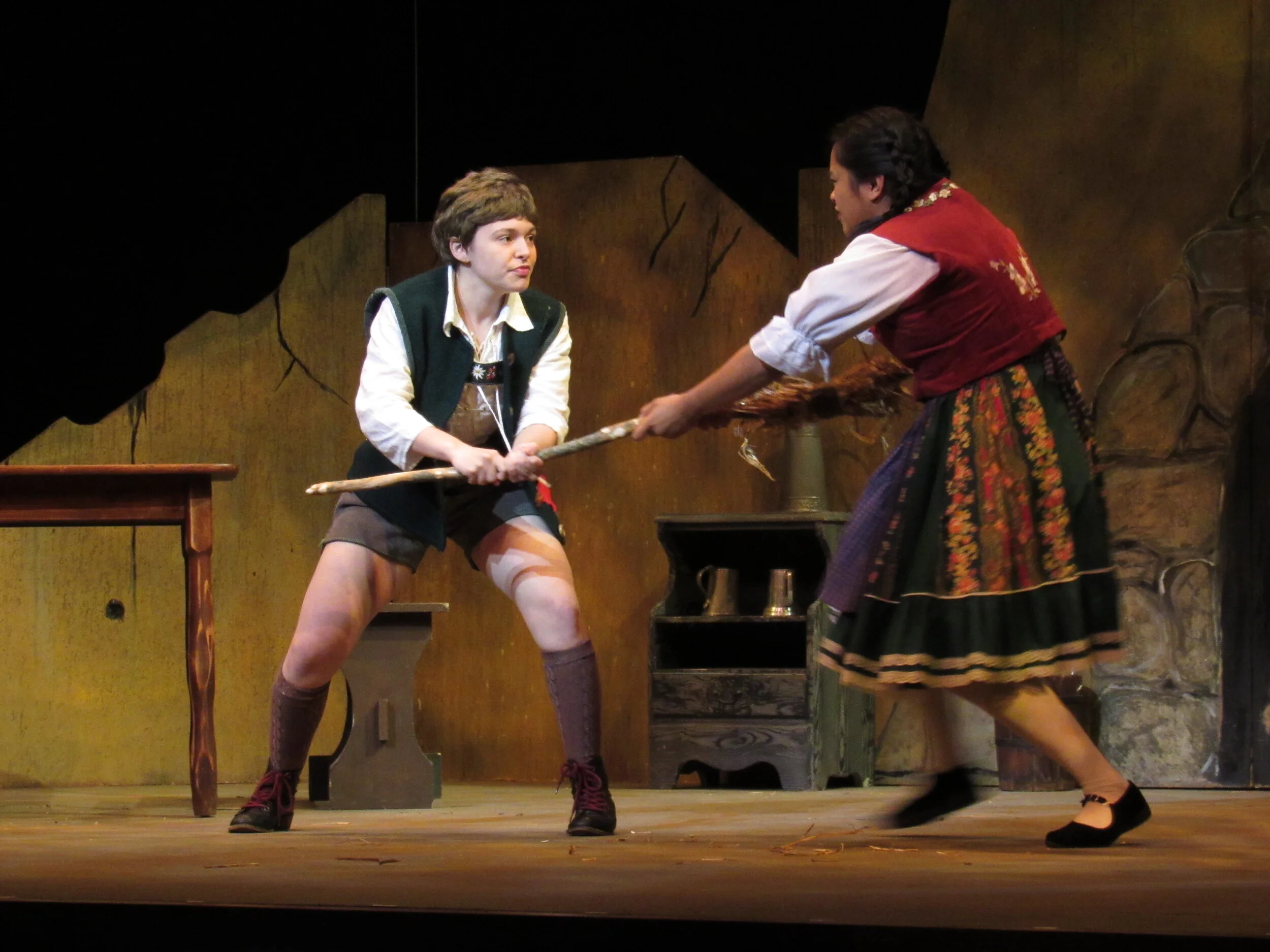 Hansel and Gretel fighting at home.