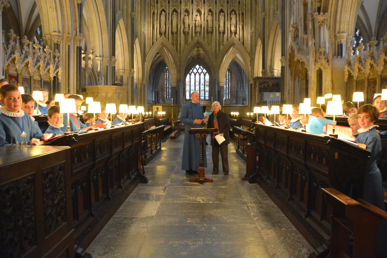 Judith Weir CBE with Matthew Owens and the choristers (above) The head choristers ask the composer to sing their scores (below)