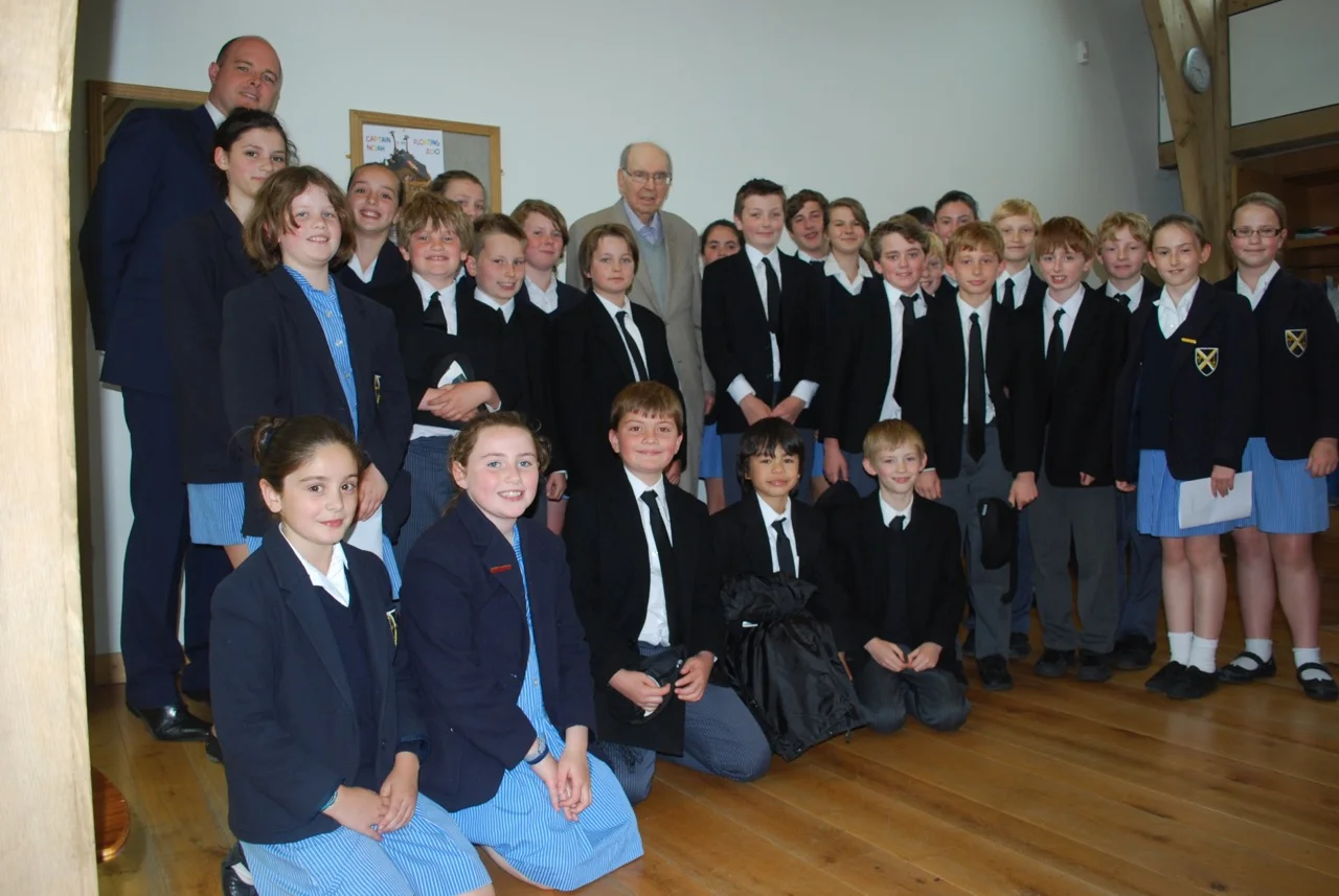 Joubert pictured with the choristers of June 2013, following the first performance of Missa Wellensis