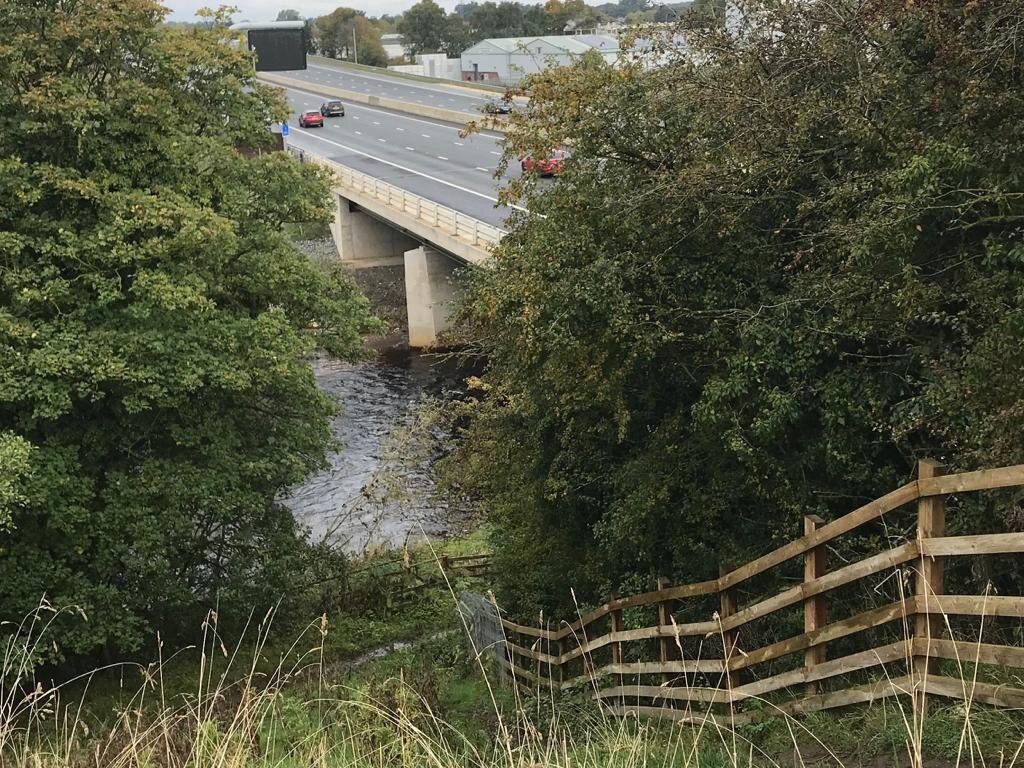 Heading down to the path under the motorway