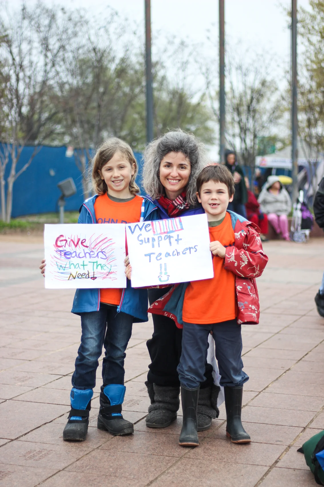 "I think it’s important to bring my kids out here, so they can see what we’re doing, that this affects their future. I think it’s our duty to be here, and to be out here for those who can’t be here, holding our signs and saying what we’re saying. So I think it’s a good example." —Moriah Guild, parent of two John Rex Charter Elementary students