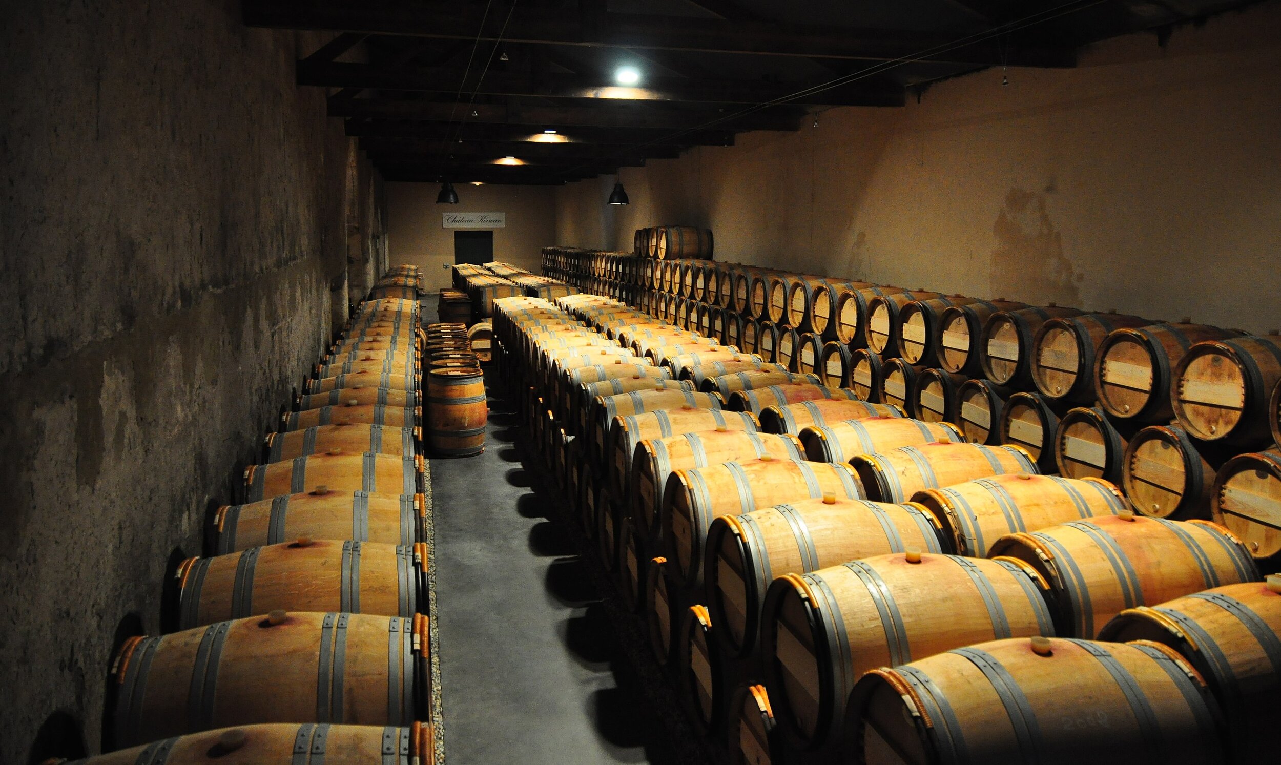 2880px-Wine_Cellar_at_Chateau_Kirwan.jpg