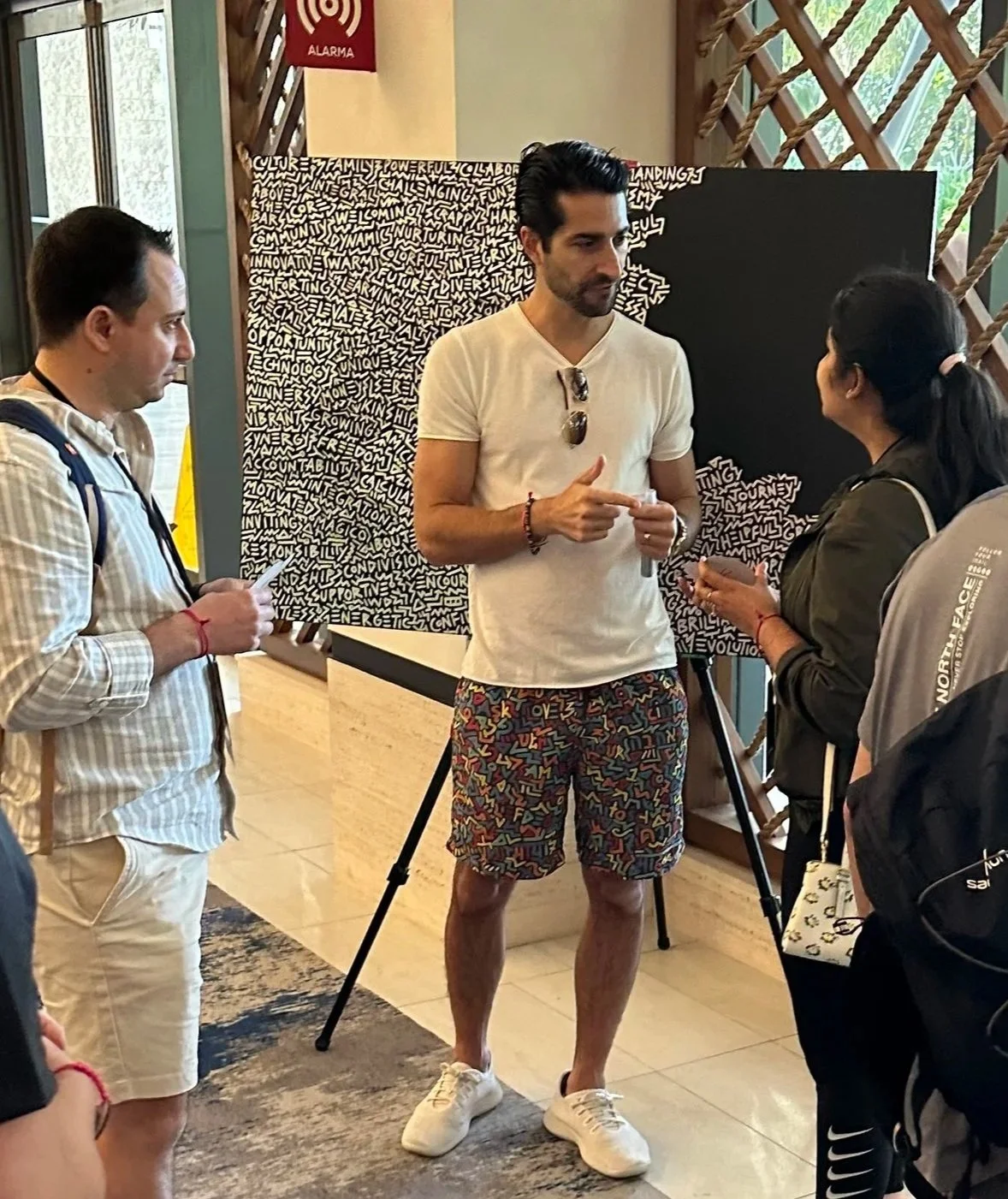 Marco Santini creating live artwork at a corporate event