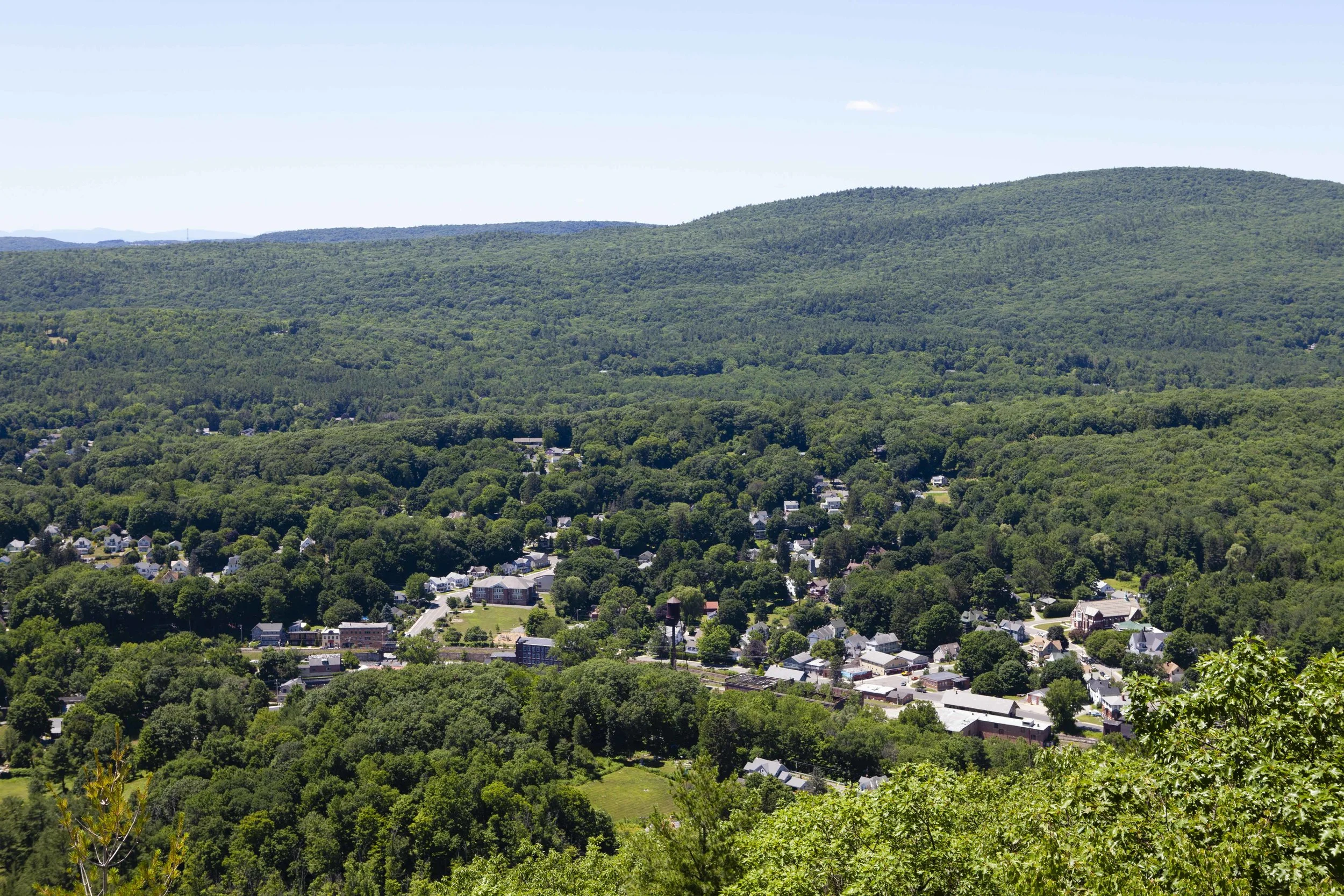 You can almost see the house from this vantage point. It's just to the right of the school at slightly left from center of this frame. 