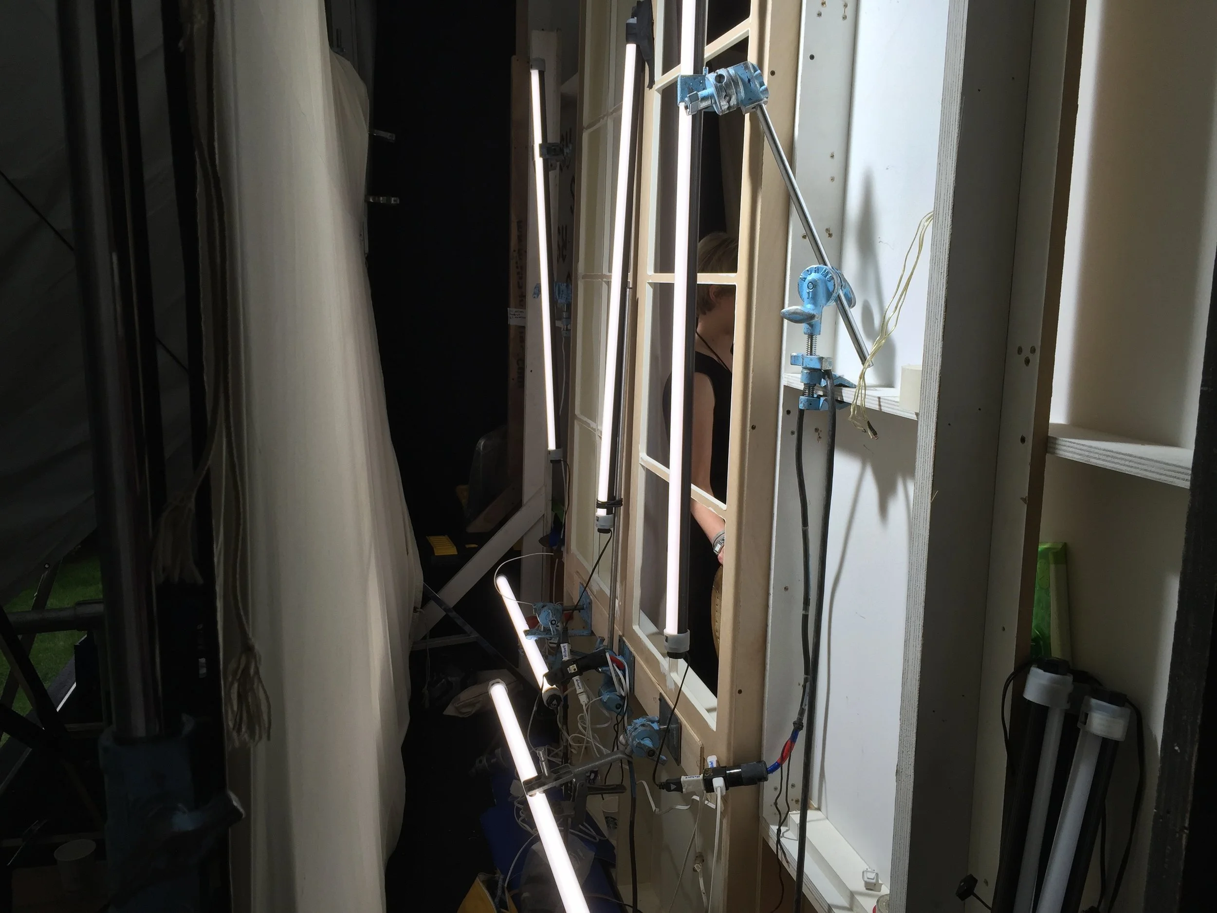 We string Quasars behind the windows, but ultimately had to supplement with HMIs.