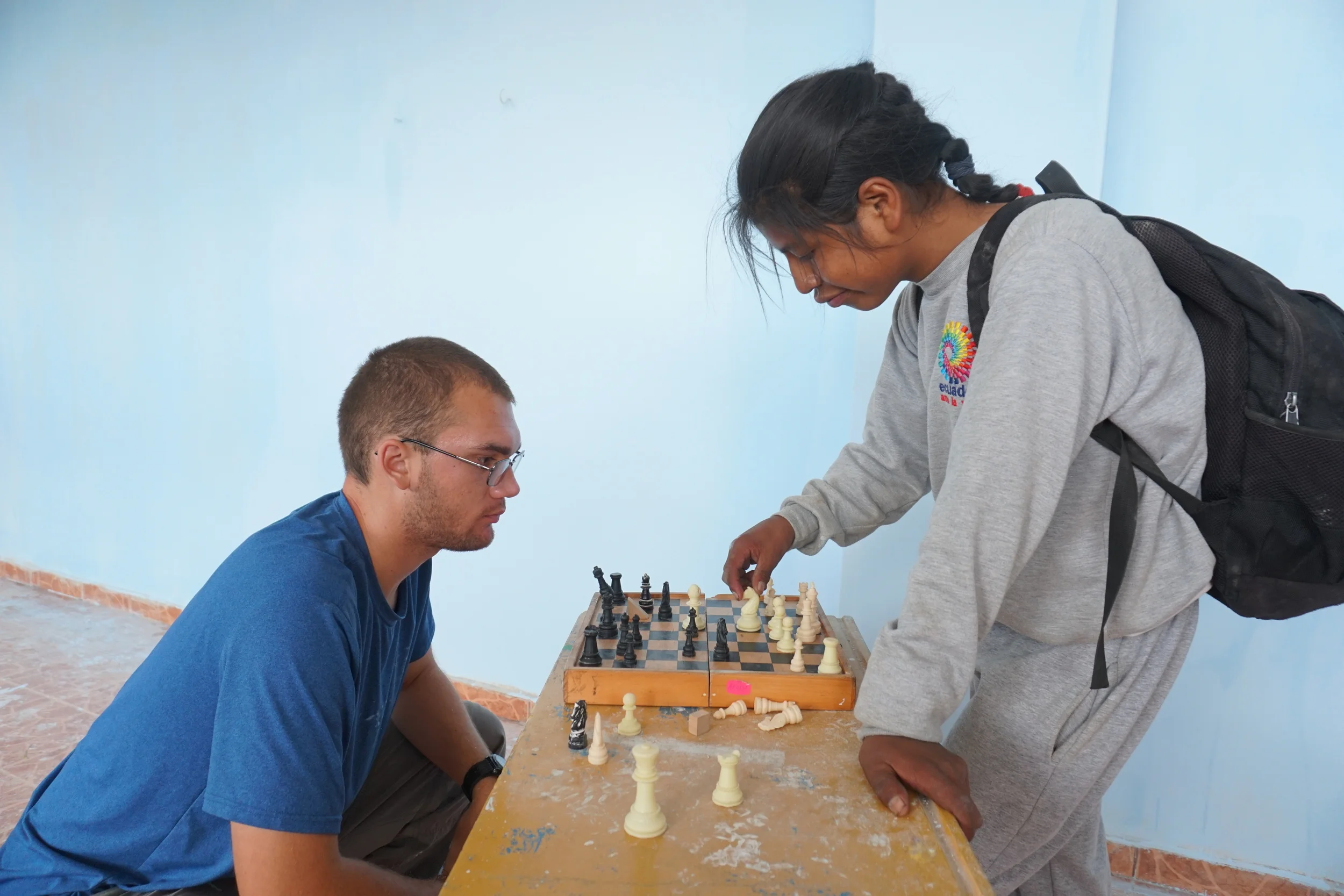 Skyler, not letting language barriers stop him from having meaningful interactions. Outcome of game unknown. 
